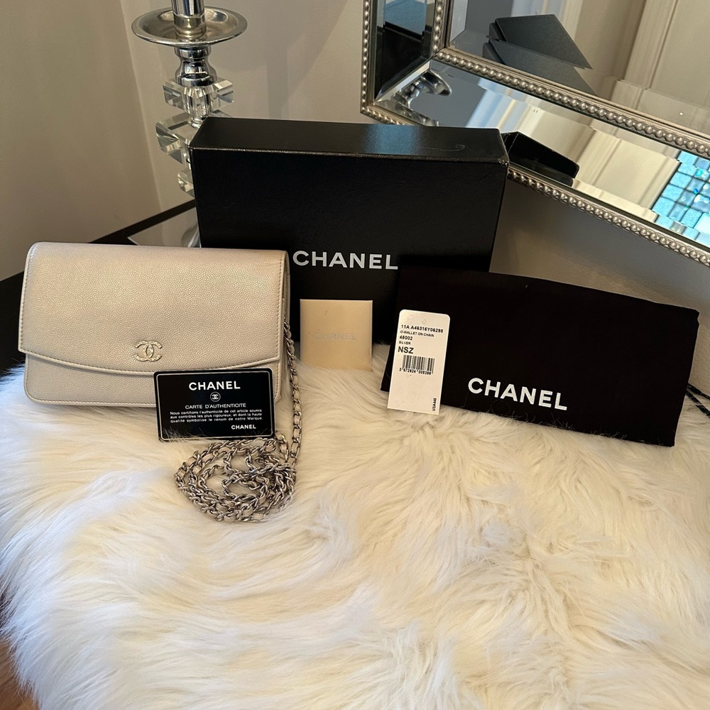 Authentic Chanel Silver WOC.  Excellent condition.